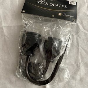 Cambria Collection Holdbacks